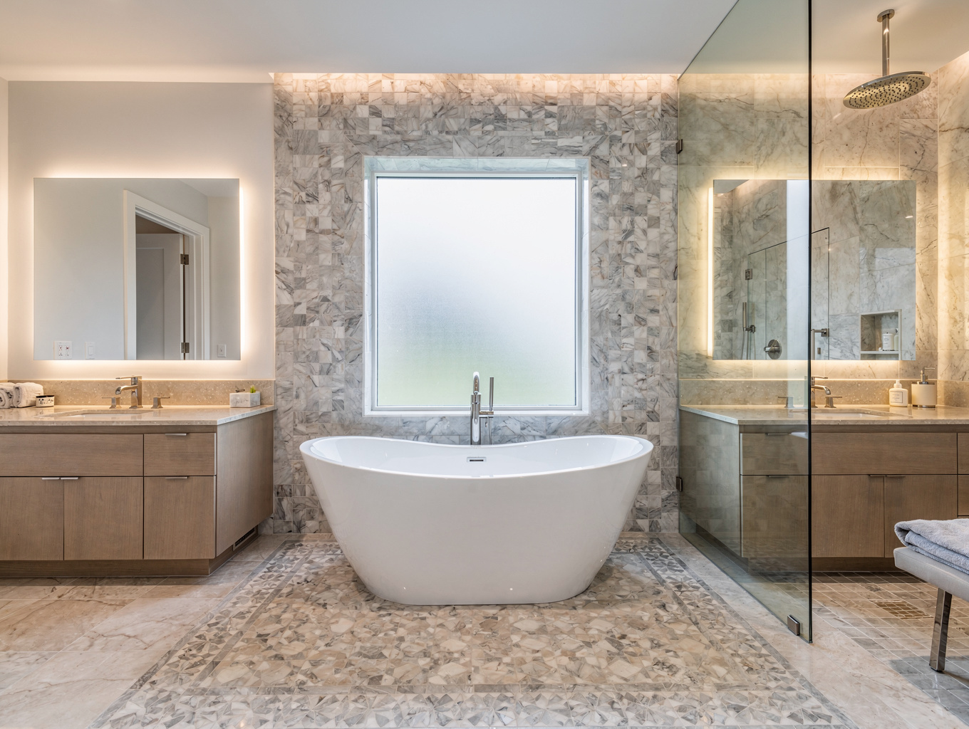 Luxury master bathroom suite with freestanding tub and walk-in shower
