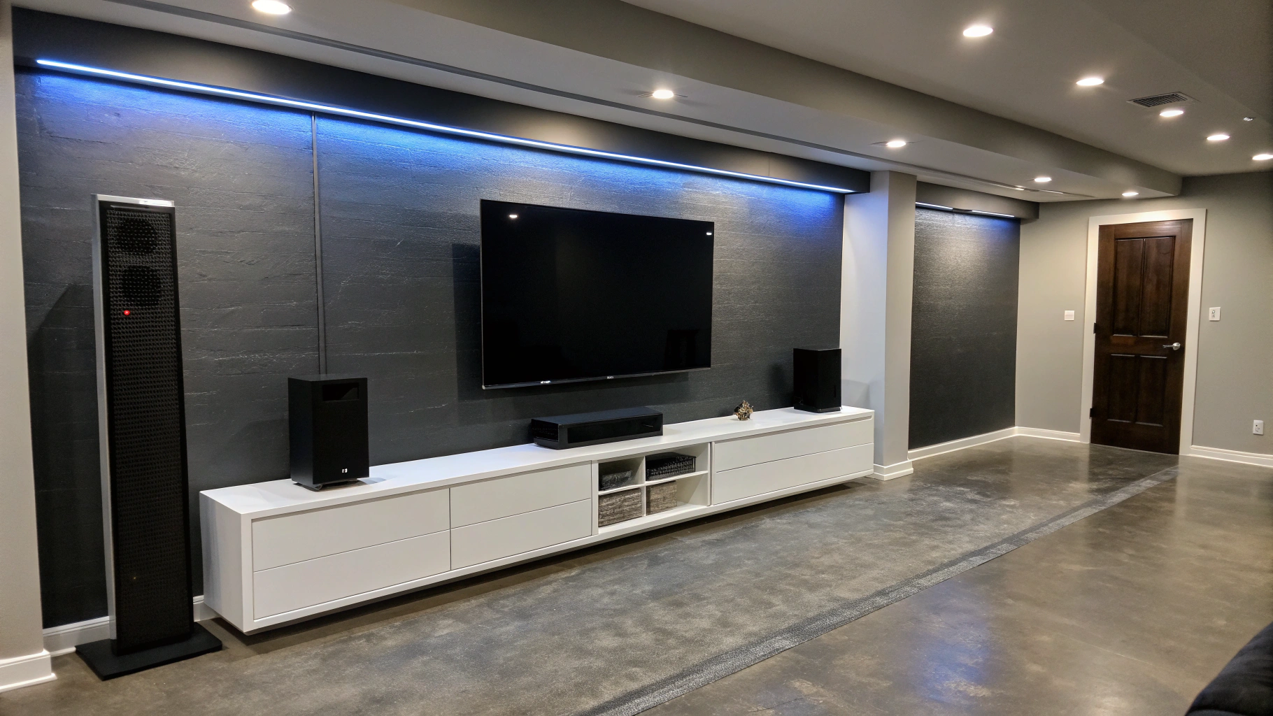 Finished basement retreat with acoustic wood slats and ambient lighting