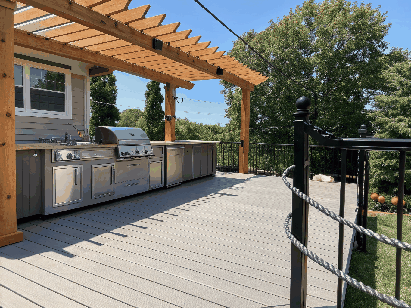 Timber framed porch retreat with outdoor kitchen and stone fireplace