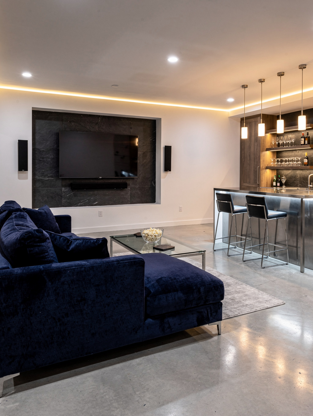 Finished walkout basement with a lounge area and large windows